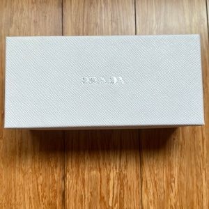 Selling partially used Prada Sunglasses. In good condition.